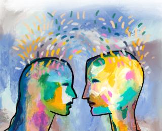 A colorful, simple painting of two people's heads facing one another, with brighly colored sparks or energy radiating off of them.