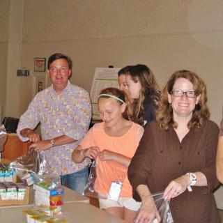 Service project making snack packs at the Central Unitarian Church of Paramus, NJ.