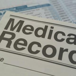 Picture of a document that says "Medical Record"