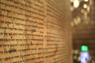 Ancient scroll of Isaiah found in Qumran on display at Israel Museum.