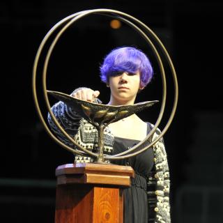 Emma Merchant lighting the chalice at General Assembly 2014