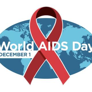 A red ribbon in front of a blue globe overlayed with "World AIDS Day December 1." 
